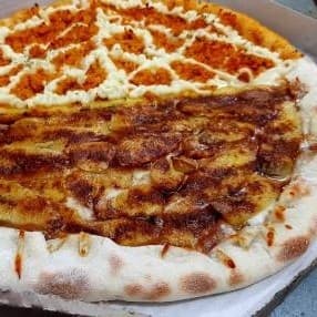Pizza GG + refri grátis e borda recheada.